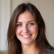 Professional headshot of Sophie Dubois, a smiling female instructor.